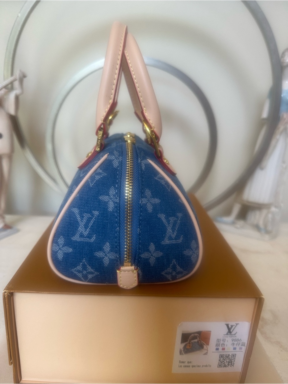Lux inspired Nano Speedy bag is blue monogram denim. - Picture 9 of 16